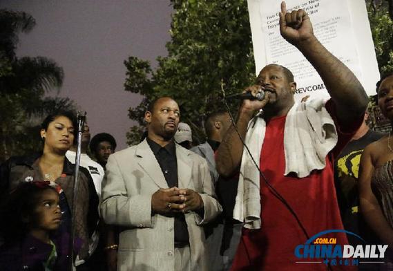 African Americans hold a gathering at a local park in Los Angels to express their diappointment with the acquittal of George Zimmerman.