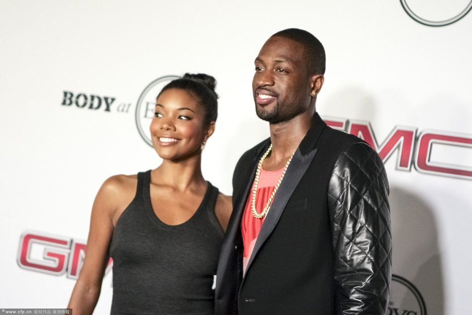 Actress Gabrielle Union (L) and NBA player Dwyane Wade arrive at ESPN the Magazine's 'Body Issue' 5th annual ESPY's event at Lure on July 16, 2013 in Hollywood, California. 