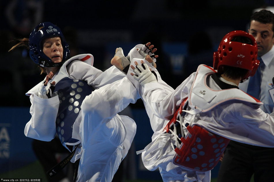 China's Li Yao Yao Li competes with Croatia's Ana Zaninovic during their fight in the category of -53 kilograms for the World Championship of Taekwondo in Puebla, Mexico, 18 July 2013. 