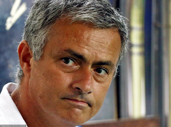 Jose Mourinho looks on during the match between Chelsea and Indonesia All-Stars at Gelora Bung Karno Stadium on July 25, 2013 in Jakarta, Indonesia.