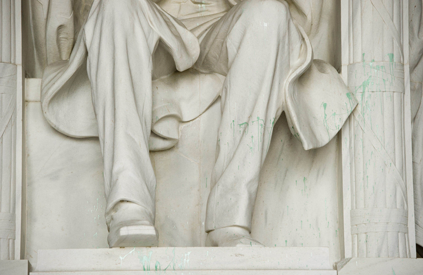 The Lincoln Memorial is covered in green paint on the National Mall in Washington, DC, July 26, 2013.