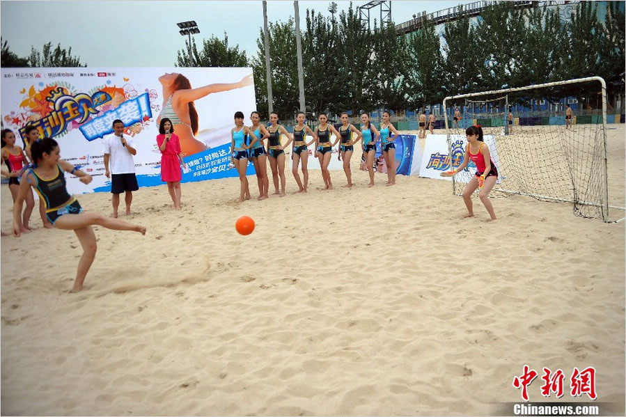 Bikini babes in penalty shoot-out contest