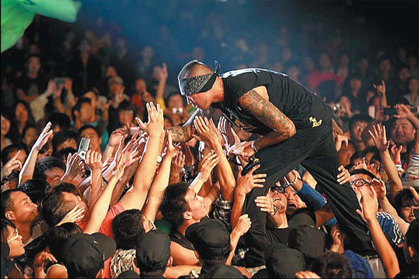 Music festivals have become a way for Chinese fans to access rock music. [China Daily]