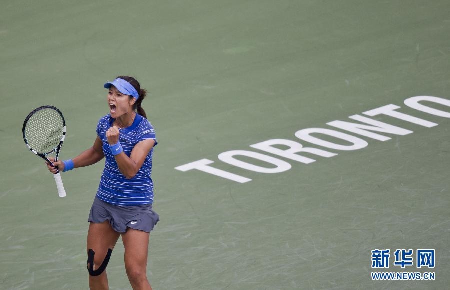 Li Na reacts in a last 16 encounter against Ana Ivanovic at Rogers Cup in Rexall Centre at York University on August 8, 2013 in Toronto.