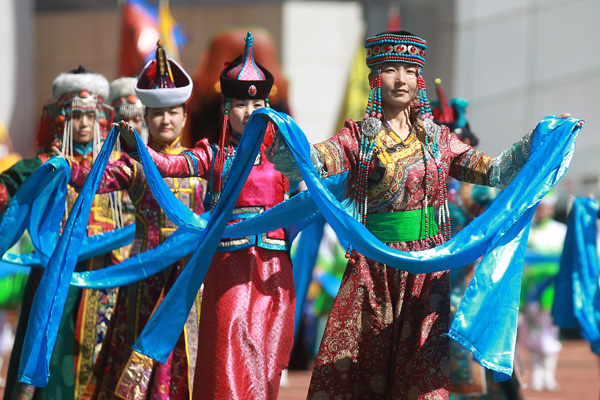 The Naadam Festival in Xinlingol runs through Sunday. Featuring a range of sports and artistic events, the fair is the Inner Mongolia Autonomous Region&apos;s largest traditional festival and this year attracted around 3,000 athletes. [Photo/China Daily]