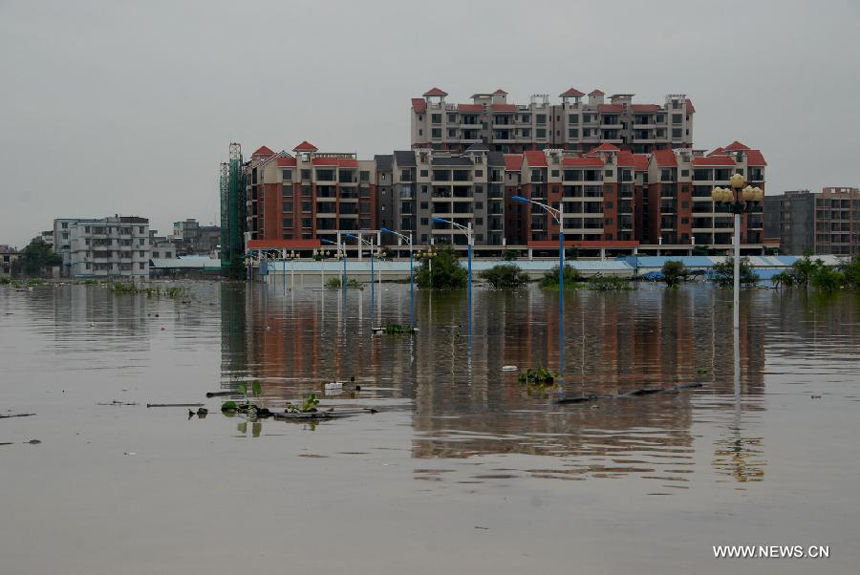 Streets are flooded in Hanguang Town of Yingde City, south China&apos;s Guangdong Province, Aug. 18, 2013. 