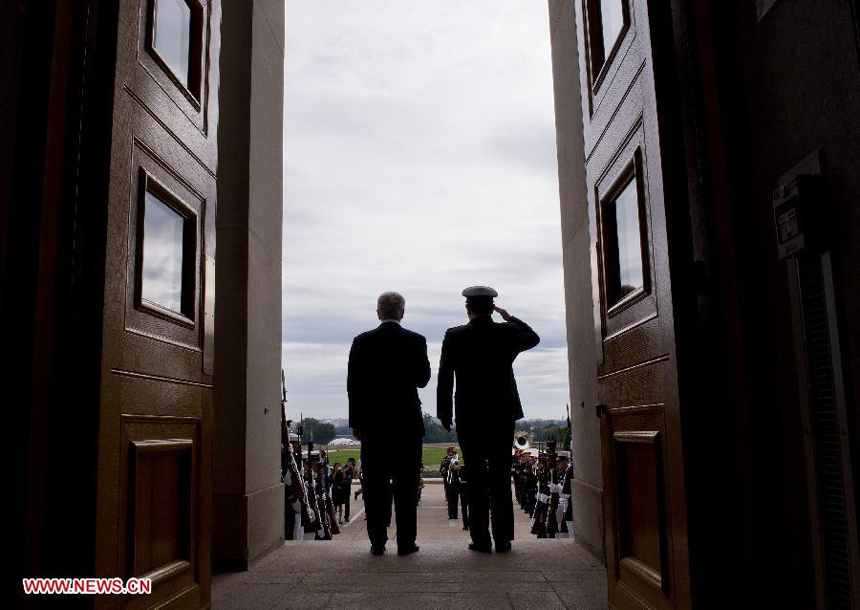 Chinese State Councilor and Defense Minister Chang Wanquan (R) is welcomed by U.S. Secretary of Defense Chuck Hagel during their meeting in the Pentagon in Washington D.C. , the United States, on Aug. 19, 2013.