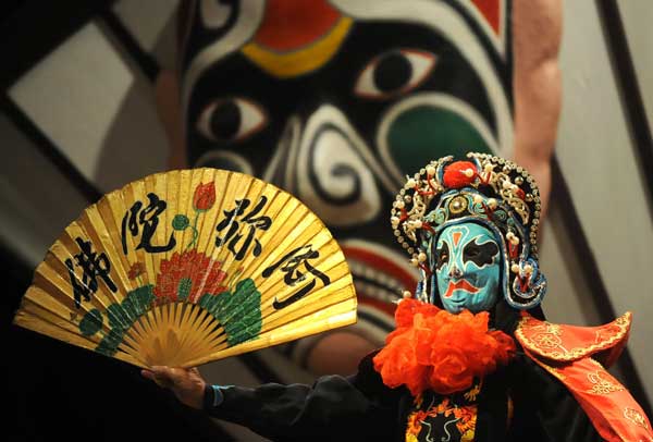 A demonstration of face-changing skills during a Sichuan opera performance at the Temple of the Marquis of Wu in Chengdu. Performers change one mask to another in the blink of an eye, using secret techniques known only to themselves. 