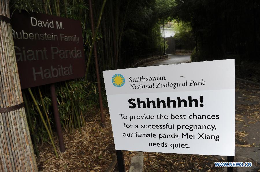 A sign is seen outside the giant panda habitat of the Smithsonian's National Zoo in Washington D.C., capital of the United States, Aug. 23, 2013. 