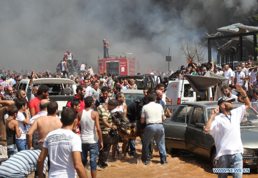 A blast site is seen in Tripoli, Lebanon, Aug. 23, 2013. At least 27 people were killed and 358 others injured on Friday when two powerful explosions rocked Lebanon's northern port city of Tripoli, the country's caretaker Health Minister Ali Hassan Khalil told reporters. [Omar/Xinhua]