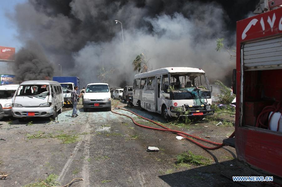 The blast site is seen in Tripoli, Lebanon, Aug. 23, 2013. At least 27 people were killed and 358 others injured on Friday when two powerful explosions rocked Lebanon's northern port city of Tripoli, the country's caretaker Health Minister Ali Hassan Khalil told reporters. [Omar/Xinhua]