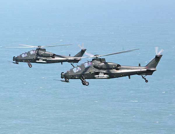 China's first self-developed modern military attack helicopter WZ-10 has launched its first air-to-air missile and successfully intercepted low-altitude targets.