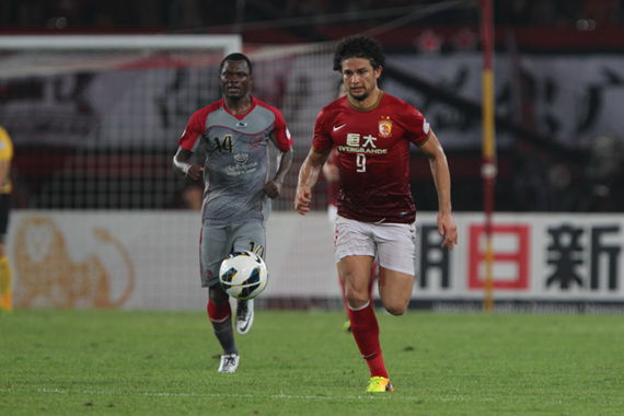 Brazilian striker Elkeson scored on his AFC Champions League debut as China's Guangzhou Evergrande recorded a 2-0 win over Qatar's Lekhwiya in Wednesday's quarter-final first leg.