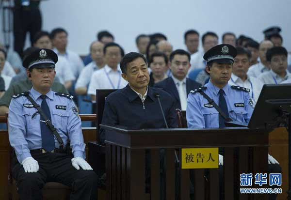 Photo taken on Aug. 26, 2013 shows the court trial of Bo Xilai (C, front) at Jinan Intermediate People's Court in Jinan, capital of east China's Shandong Province. 