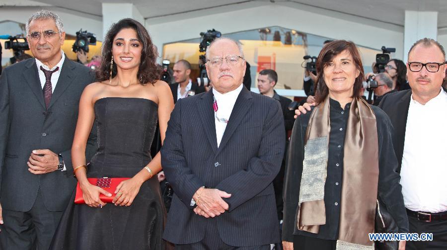 Members of the international Jury of Orizzonti pose at the opening ceremony red carpet of the Venice Film Festival on the Lido island of Venice , Italy, Aug. 28, 2013. [Yan Ting/Xinhua]