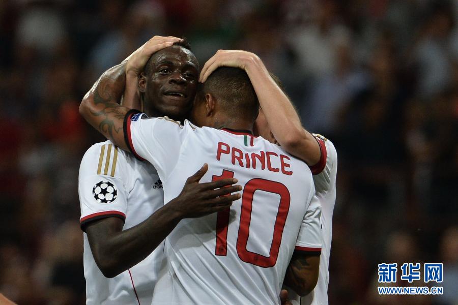  Boateng and Balotelli celebrate.