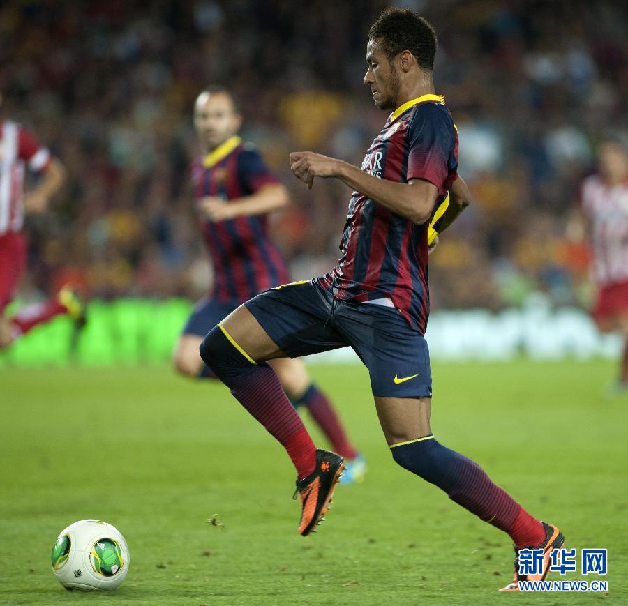 Barca's Neymar runs with the ball. 