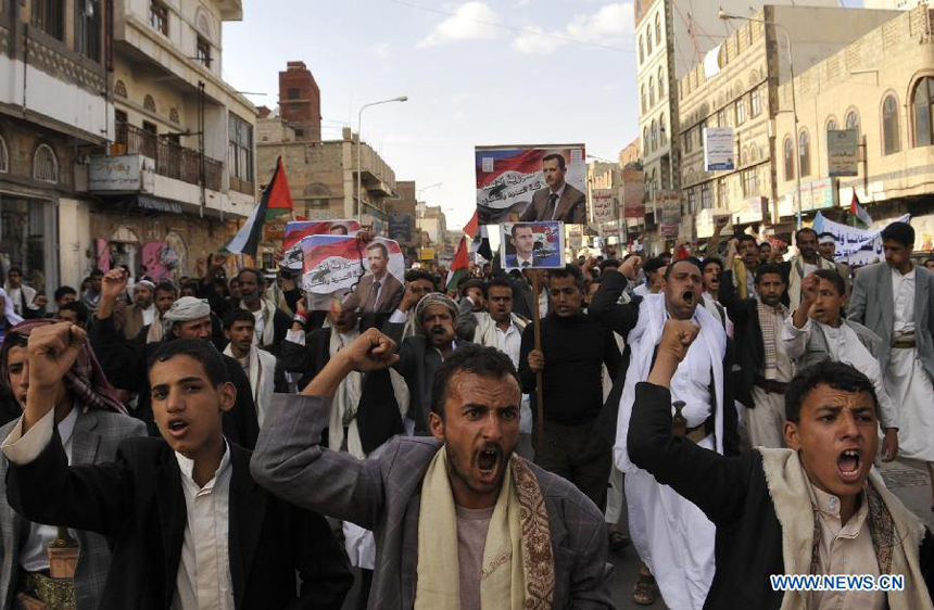 Yemeni protesters shout slogans to show support for the Syrian government during a demonstration held in Sanaa, Yemen, on Aug. 30, 2013. Thousands of Yemeni people took to street to announce their refusal of possible U.S.-led military attack on Syria.