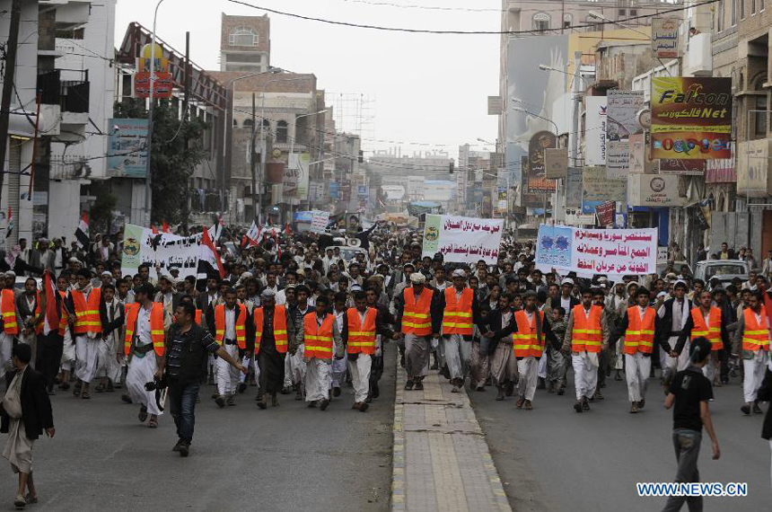 Yemeni protesters gather to show support for the Syrian government during a demonstration held in Sanaa, Yemen, on Aug. 30, 2013. Thousands of Yemeni people took to street to announce their refusal of possible U.S.-led military attack on Syria.