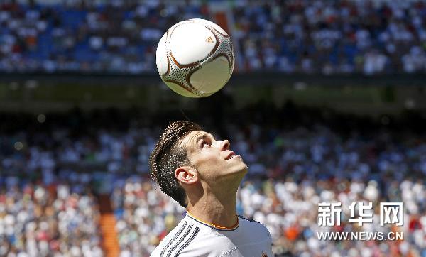  Gareth Bale shows off his silky skills to the Real fans in the Bernabeu.