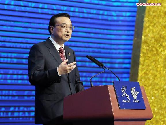 Chinese Premier Li Keqiang delivers a keynote speech at the opening ceremony of the tenth China-ASEAN Expo in Nanning, capital of south China's Guangxi Zhuang Autonomous Region, Sept. 3, 2013. [Yao Dawei/Xinhua]