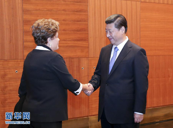 Chinese President Xi Jinping and his Brazilian counterpart Dilma Rousseff pledged in St. Petersberg on Thursday to boost solidarity and cooperation between BRICS countries.