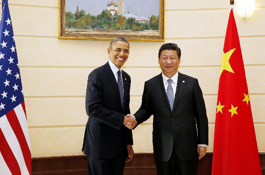 Chinese President Xi Jinping (R) meets with U.S. President Barack Obama in St. Petersburg, Russia, Sept. 6, 2013. [Photo/Xinhua]