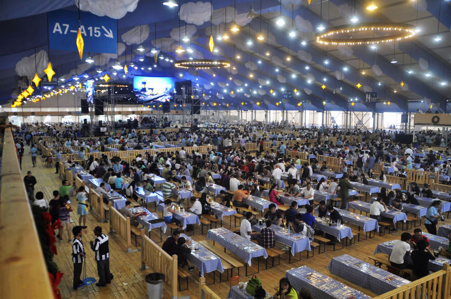 The Munich Oktoberfest started its first-ever tour of Beijing at the Beijing Olympic Park on September 6, 2013. The festival, which will run until September 21, wows beer lovers with a full range of authentic traditional beers and food from Germany.