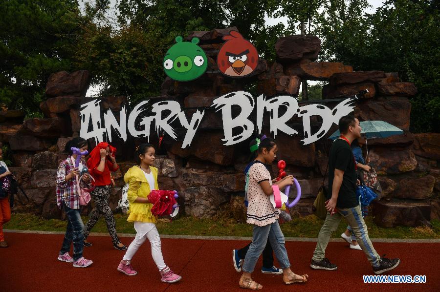 People visit the newly-built Angry Birds theme park in Haining, east China's Zhejiang Province, Sept. 7, 2013. The Angry Birds theme park, the first of its kind in China, underwent a soft opening on Saturday and is expected to officially open to the public in October. Angry Birds, created by the Finland-based Rovio Entertainment, is a popular game for smartphones and tablet computers. (Xinhua/Han Chuanhao) 