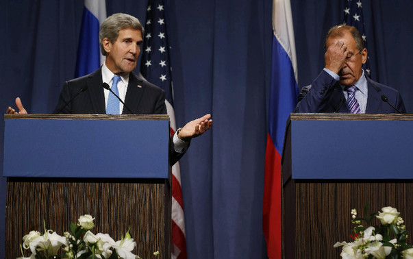 U.S. Secretary of State John Kerry and Russian Foreign Minister Sergei Lavrov hold a joint press conference in Geneva, Sept. 12, 2013. [Xinhua] 