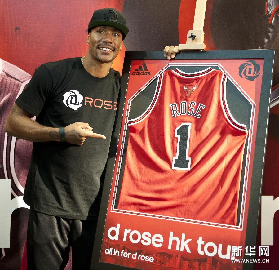 Roses shows his Chicago Bulls jersey. 