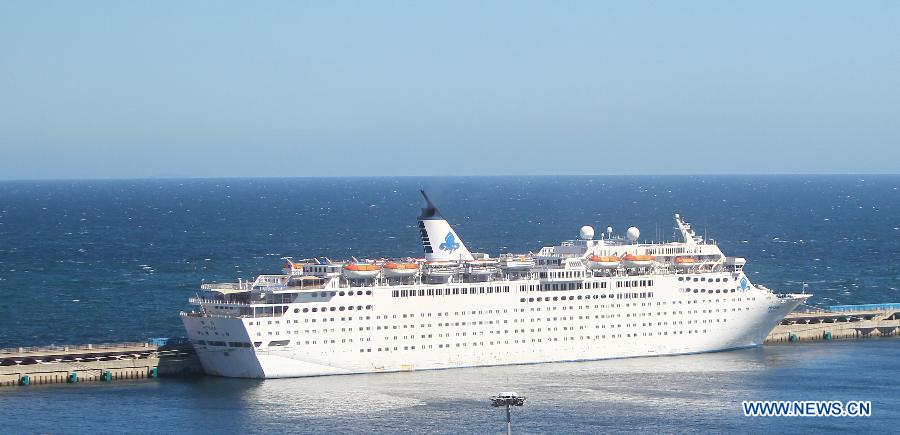 The detained Chinese cruise liner Henna is seen in Jeju, South Korea, Sept. 16, 2013. The detained Chinese cruise liner Henna departed from South Korea&apos;s Jeju Island for China at 8:30 p.m. local time on Monday with the rest of more than 50 passengers on board, according to the Chinese Consulate General in Jeju Island. 