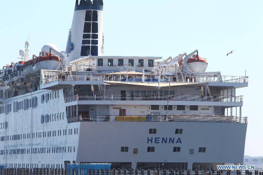 The detained Chinese cruise liner Henna is seen in Jeju, South Korea, Sept. 16, 2013. The detained Chinese cruise liner Henna departed from South Korea&apos;s Jeju Island for China at 8:30 p.m. local time on Monday with the rest of more than 50 passengers on board, according to the Chinese Consulate General in Jeju Island. 