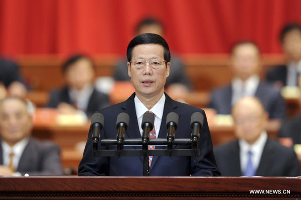 Chinese Vice Premier Zhang Gaoli, also a member of the Standing Committee of the Political Bureau of the Central Committee of the Communist Party of China (CPC), addresses the sixth national congress of the China Disabled Persons' Federation, in Beijing, capital of China, Sept. 17, 2013. 