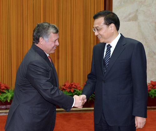 Chinese Premier Li Keqiang met with Jordanian King Abdullah II ibn Al-Hussein Wednesday in Beijing and called for closer win-win cooperation between the two countries.[Xinhua photo]