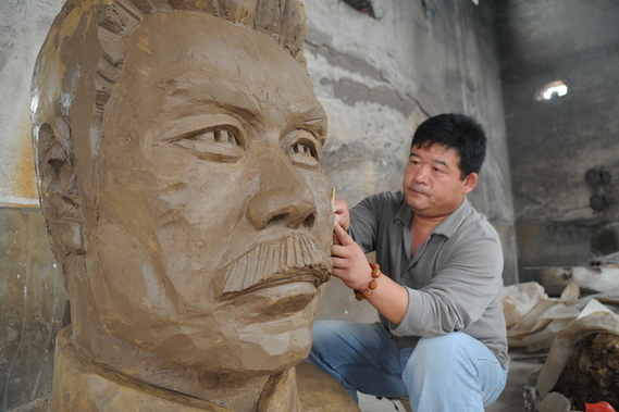 Pottery head of China&apos;s literary icon unveiled in Zibo