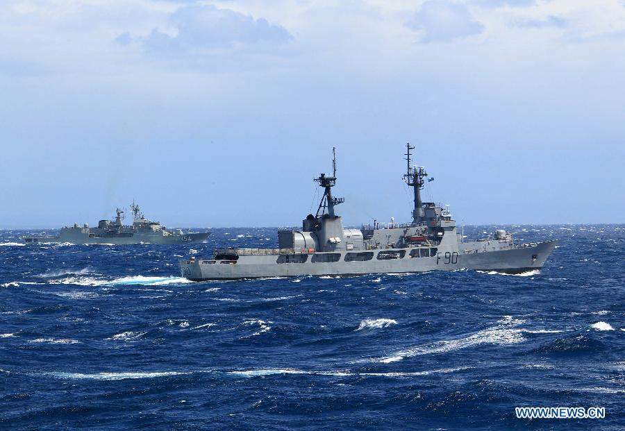 The fleet from China's Navy have arrived in Sydney Harbor to take part in the historic International Fleet Review, Oct. 4, 2013. The International Fleet Review, which runs till Oct. 11, is a week-long celebration commemorating the centenary of the first entry of the Royal Australian Navy Fleet into Sydney. More than 20 warships from 17nations will take part in the historic International Fleet Review.[Xinhua Photo] 