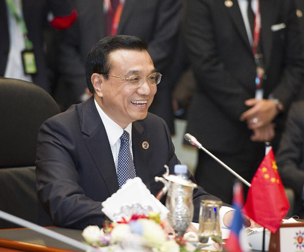 Chinese Premier Li Keqiang attends the 16th China-ASEAN leaders' meeting in Bandar Seri Begawan, Brunei, Oct. 9, 2013. [Photo/Xinhua]