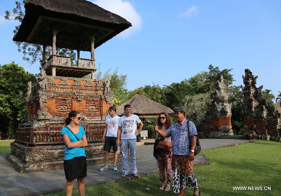 Photo taken on Oct. 5 shows tourists visiting Taman Ayun Royal Temple, a World Cultural Heritage site in Bali, Indonesia. Bali is an island and a province of Indonesia, which is located at the westernmost end of the Lesser Sunda Islands