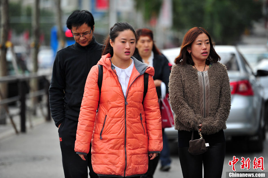 A strong cold front from the north brings down temperature in many parts of China. 