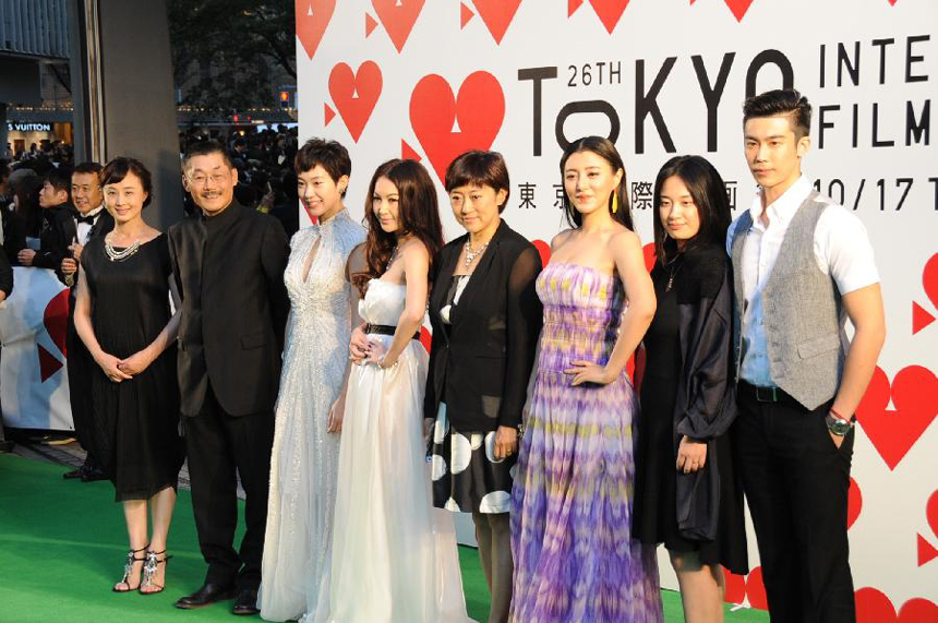 Chinese director Ping He (2nd L) attends the photo session during the opening ceremony of the 26th Tokyo International Film Festival in Tokyo, Japan, Oct. 17, 2013. 