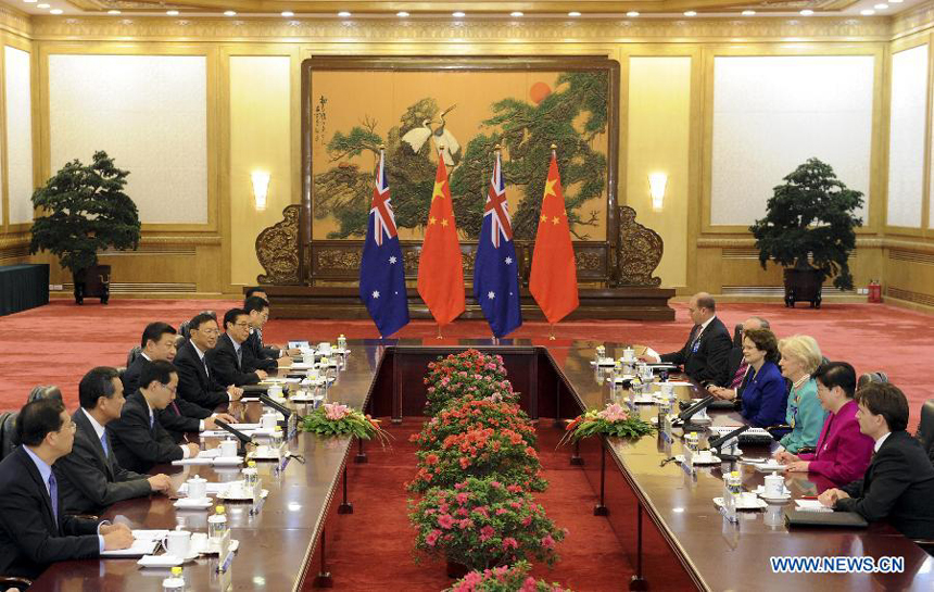 Chinese President Xi Jinping (4th L) meets with Governor-General of Australia Quentin Bryce (3rd R) in Beijing, capital of China, Oct. 17, 2013. 