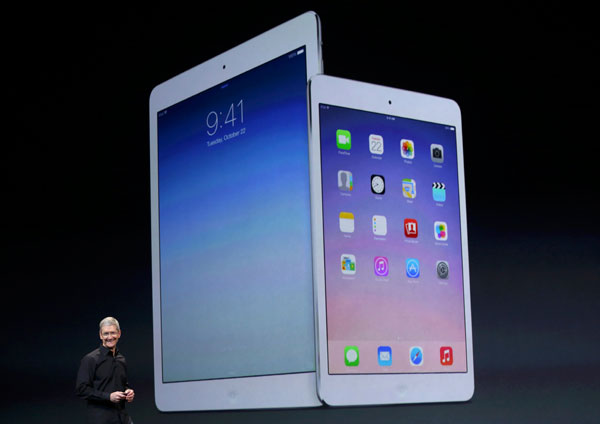 Apple Inc CEO Tim Cook speaks about the new iPad Air and the iPad mini with Retnia display during an Apple event in San Francisco, California October 22, 2013. [Photo:China Daily/Agencies]