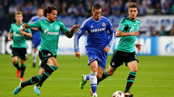  Chelsea's Fernando Torres surges away from Jermaine Jones and Roman Neustadter.