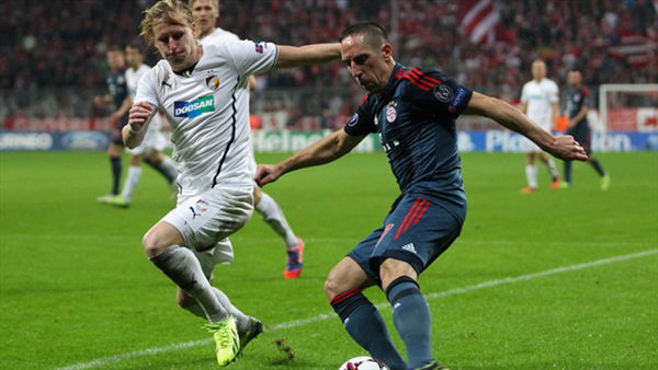  Bayern winger Franck Ribery weaves past Frantisek Rajtoral.