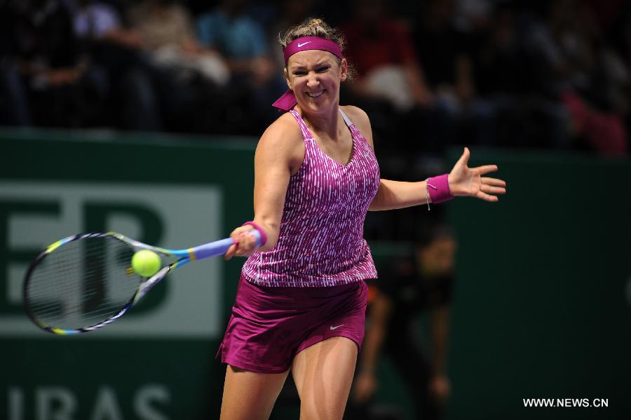 Victoria Azarenka of Belarus hits a return to Li Na of China during their WTA tennis championships match at Sinan Erdem Dome in Istanbul, October 25, 2013. Li Na won the match 2-0. 