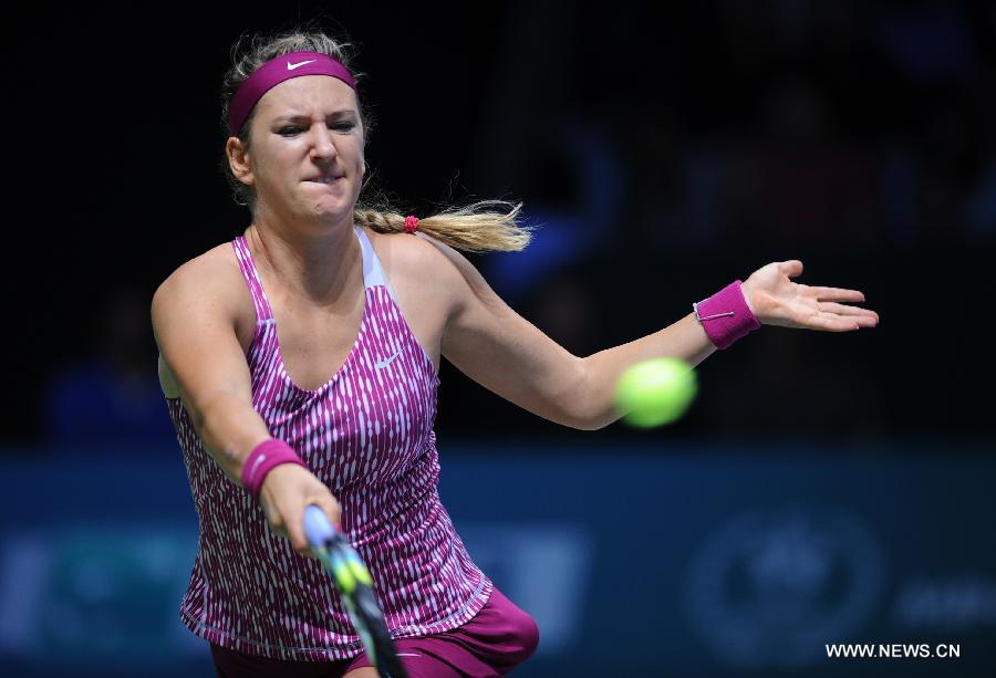 Victoria Azarenka of Belarus hits a return to Li Na of China during their WTA tennis championships match at Sinan Erdem Dome in Istanbul, October 25, 2013. Li Na won the match 2-0.