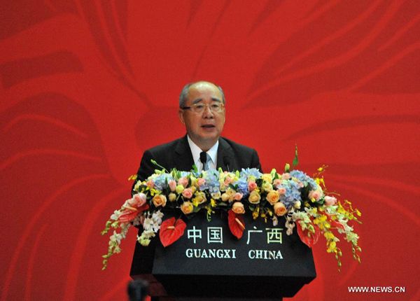 Wu Po-hsiung, honorary chairman of the Kuomintang (KMT), addresses the closing ceremony of the ninth Cross-Strait Economic, Trade and Culture Forum in Nanning, capital of south China's Guangxi Zhuang Autonomous Region, Oct. 27, 2013. (Xinhua