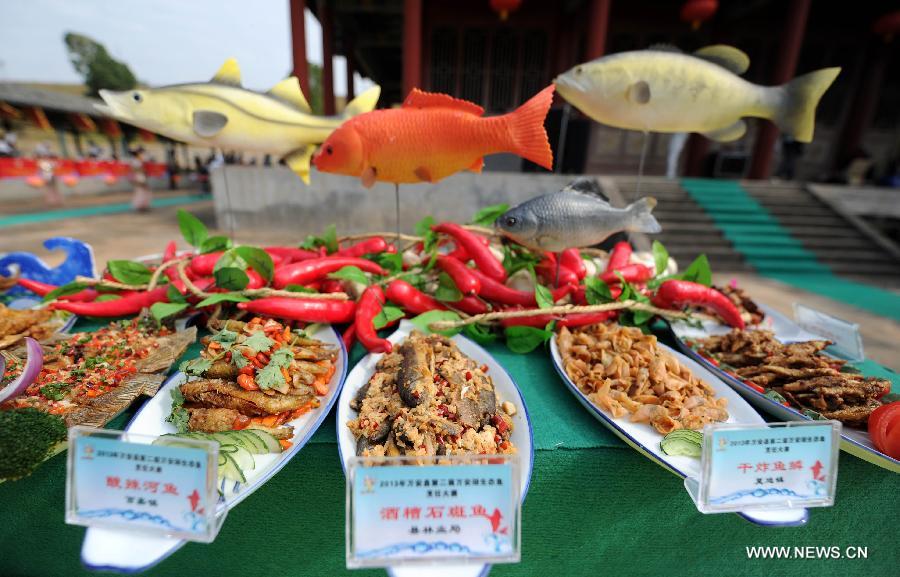 Photo taken on Oct. 30, 2013 shows various dishes at a fish cooking contest held in Wan'an County, east China's Jiangxi Province.