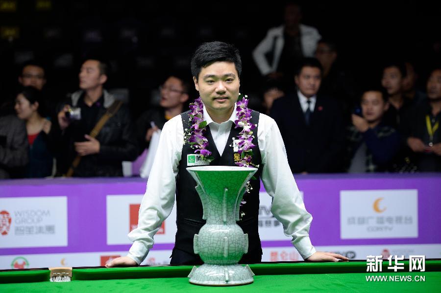 Ding Junhui defeated Hong Kong's Marco Fu 10-9 in a closely-contested final of the International Championship in Chengdu on Sunday.